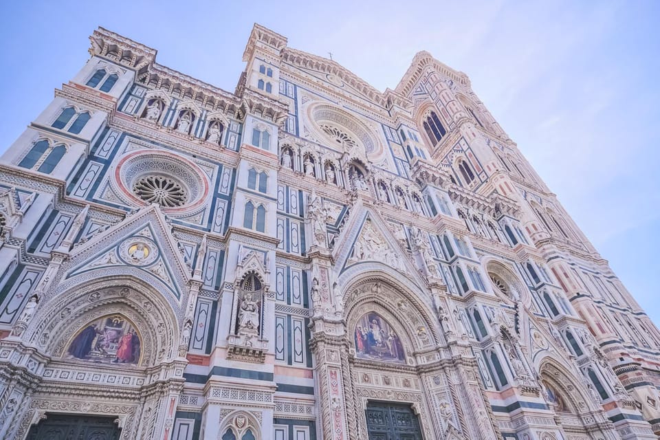 Florence: Duomo Cathedral Skip-the-Line Guided Tour - Inside Santa Maria del Fiore: marble, naves, and stained glass light