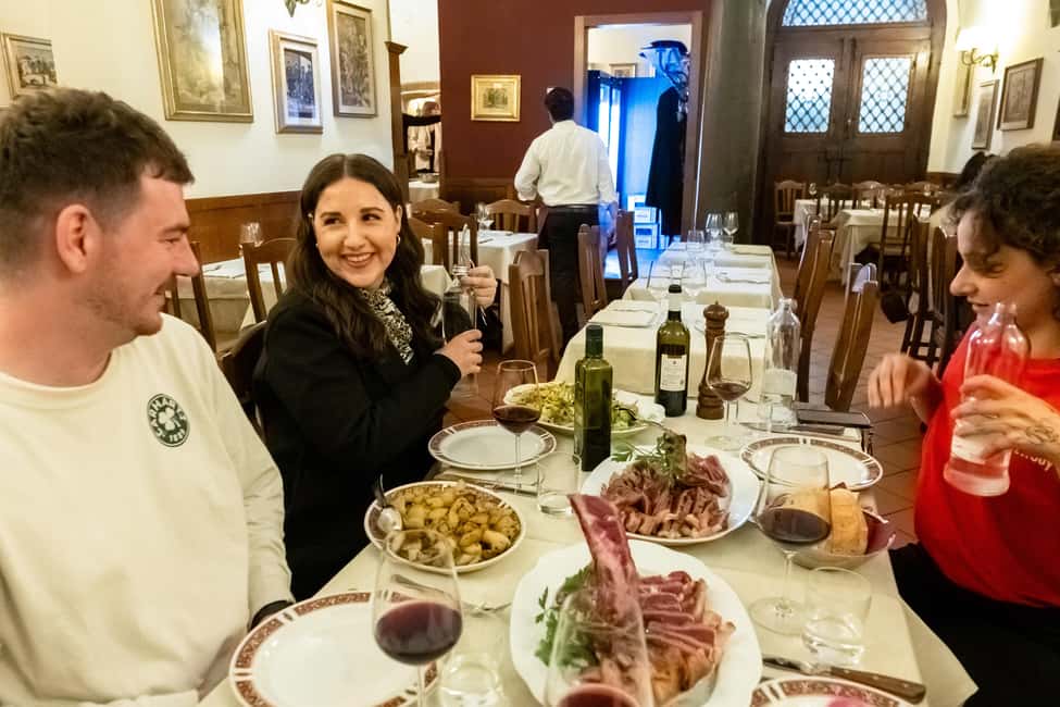 Florence: Food Walking Tour with Local Steak and Tuscan Wine - Ponte Vecchio photo break: iconic view, short stop, good payoff