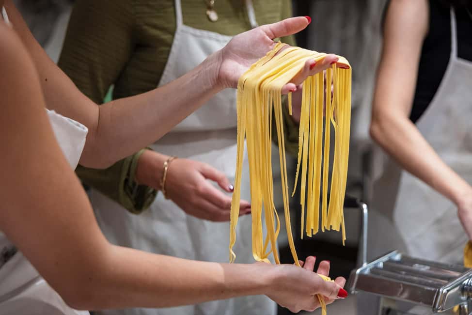 Florence: Handmade Pasta & Dessert Class with Unlimited Wine - The meal right after cooking: wine makes the whole thing stick