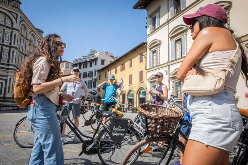 Florence: The Original City Bike Tour with a Guide - What’s Included: Helmets, the Guide, and Photo Stops