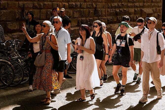 Florence Walk Tour + Wine Windows Option | Discover, Sip, Enjoy! - Arno River Views and Ponte Vecchio Direction