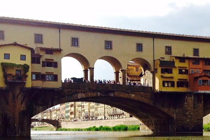 Skip-the-Line Florence Highlights and David Walking Tour - The walk that stitches Florence together: Strozzi, Tornabuoni, and two bridges